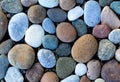 Round colorful stones on the bank of Baikal lake.