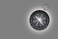 Round compass on gray background as symbol of tourism with compass, travel with compass and outdoor activities with compa Royalty Free Stock Photo