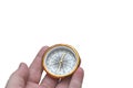 Round compass in hand isolated on white background for ab