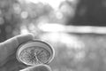 Round compass on natural background