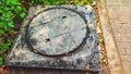 Round Concrete Cover for Telephone Connection Hole at the edge of the sidewalk