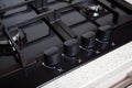 Knobs control gas stove close-up Royalty Free Stock Photo