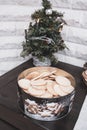 In round cookie tin are the ready-baked Christmas cookies Royalty Free Stock Photo