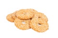 Round cookies with sesame seeds on white