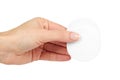 Round cotton pads in hand, isolated on white background Royalty Free Stock Photo