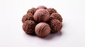 Round delicious chocolate candies on light background