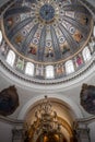 Round dome in a catholic church with painted interior Royalty Free Stock Photo
