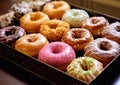 Round donuts pastry with colorful glazing and sprinklers in shop box.Macro.AI Generative