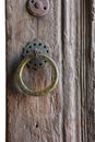 round door handle with an arabic inscription, the old wooden door Royalty Free Stock Photo