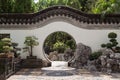 Round doorway at the Kowloon Walled City Park in Hong Kong Royalty Free Stock Photo