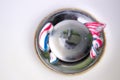 Round drain hole in white sink with toothpaste Royalty Free Stock Photo