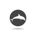 Round emblem with a dolphin icon with shadow Royalty Free Stock Photo