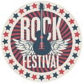 Round emblem with the guitar for a rock festival