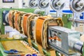 Rectangular coils for distribution transformers on winding machine Royalty Free Stock Photo