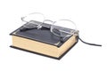 Round Eyeglasses and book