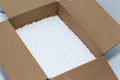 Round foam balls in a cardboard box. Environmental protection