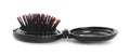 Round folding hair brush with mirror isolated