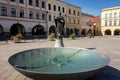 Round fountain with Socha svateho Mikulase statue at Masarykovo namesti town square in Novy Jicin