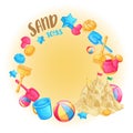Round frame of beach toys for sand and sand castle. Royalty Free Stock Photo