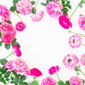 Round frame of beautiful ranunculus flowers, roses and leaves on white background. Flat lay, top view. Floral lifestyle compositio Royalty Free Stock Photo