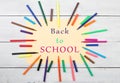 Round frame from colorful felt-tip pens and yellow paper with text & x22;Back to SCHOOL& x22; Royalty Free Stock Photo