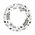 Round frame of doodle twigs and flowers. Royalty Free Stock Photo