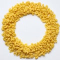 Round frame made of raw pasta on white background. Top view. Royalty Free Stock Photo