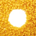 Round frame made of dry ditalini pasta over isolated white background Royalty Free Stock Photo