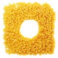 Round frame made of dry ditalini pasta over isolated white background Royalty Free Stock Photo