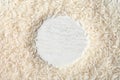 Round frame made with long grain rice on white background, top view Royalty Free Stock Photo