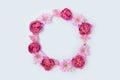 Round frame made of pink rose, aster and alstroemeria