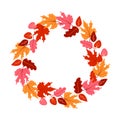 Round frame with orange, pink and yellow leaves. Bright autumn wreath with empty space for text Royalty Free Stock Photo