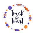 A round frame with wrapped sweets. Hand lettering-trick or treat. Halloween decoration. Color flat cartoon vector illustration on Royalty Free Stock Photo