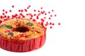 A Round Fruit Cake with Cherries Pineapples and Nuts on a White Background Royalty Free Stock Photo