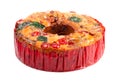 A Round Fruit Cake with Cherries Pineapples and Nuts on a White Background Royalty Free Stock Photo
