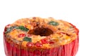 A Round Fruit Cake with Cherries Pineapples and Nuts on a White Background Royalty Free Stock Photo