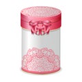 Round gift box with bow and pink lace pattern.