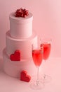 Round gift boxes, red hearts and glasses of sparkling wine Royalty Free Stock Photo