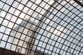 Round glass roof ceiling of moden building with metal geometric pattern frame