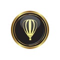 Round golden button with hot air balloon icon