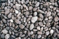 Round gray gravel pattern. Abstract background texture. Top view. Background from sea gray stones Royalty Free Stock Photo