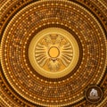 Round greek tile geometric background with two head eagle in center Royalty Free Stock Photo
