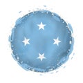 Round grunge flag of Micronesia with splashes in flag color Royalty Free Stock Photo
