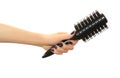 Round hair brush in hand