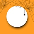 Round halloween card with spiderweb.