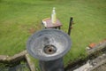 Round hand wash basin on the edge of the garden Royalty Free Stock Photo
