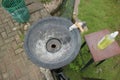 Round hand wash basin on the edge of the garden Royalty Free Stock Photo