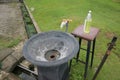 Round hand wash basin on the edge of the garden Royalty Free Stock Photo