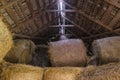 Round hay bales in barn Royalty Free Stock Photo