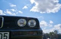 Round headlight on a old BMW car Royalty Free Stock Photo